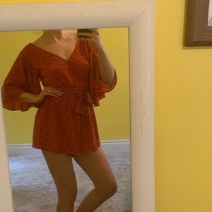 Red floral romper SUPER flattering!